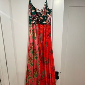 Adjustable tie in the front and adjustable straps. Pink green and reds!